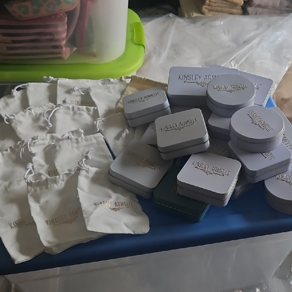 Kinsley Armelle White Pouches & White Tins.